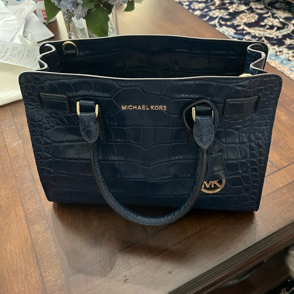 Brand new navy blue Michael Kors hand bag W/ dust bag.